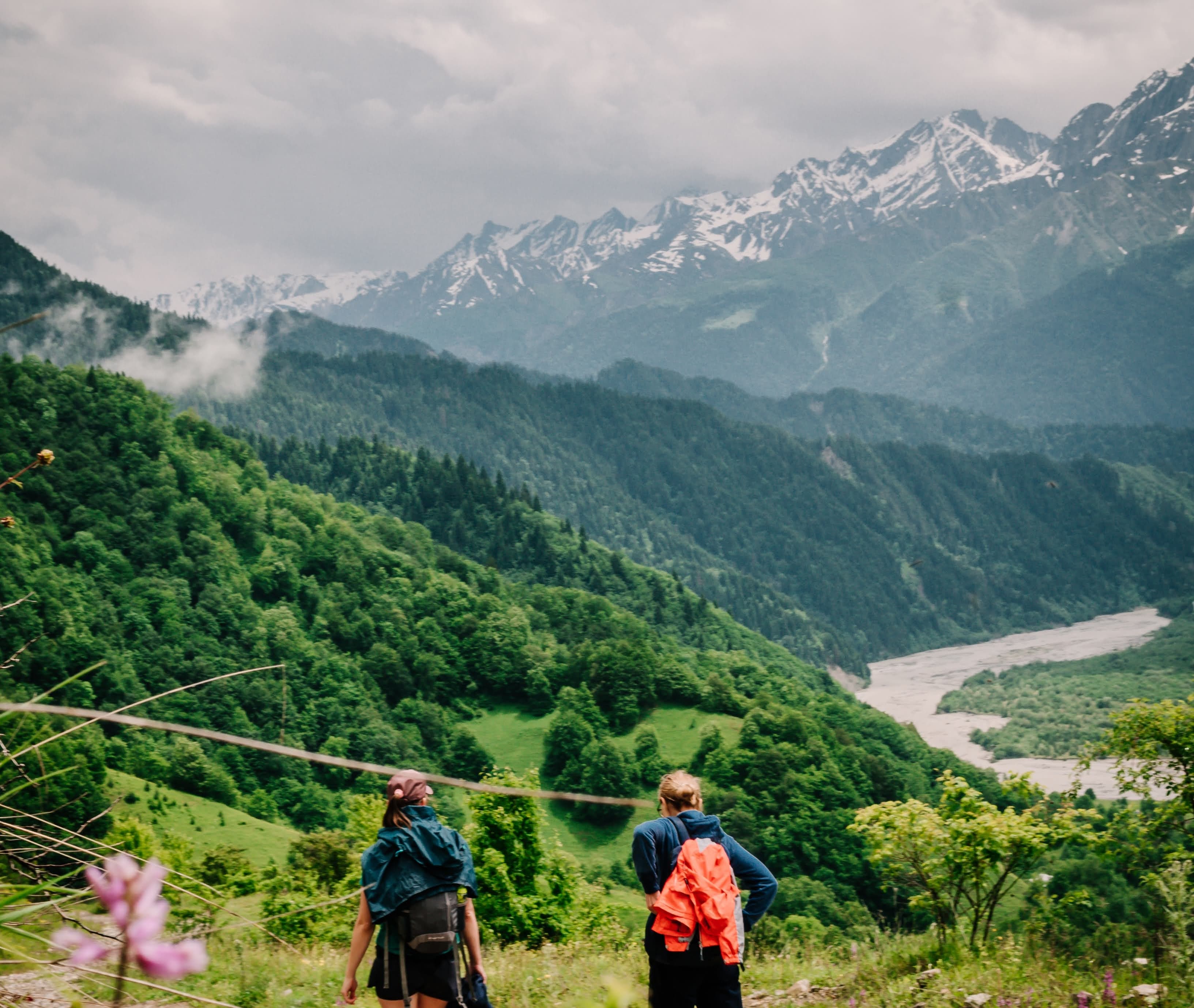 Hikers overlooking mountain valley near Chiora Inn
